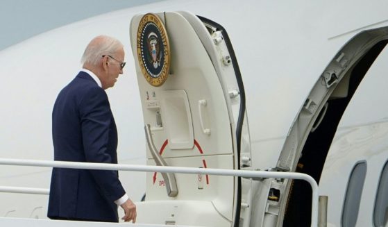President Joe Biden boards Air Force One Friday at Joint Base Andrews in Maryland.