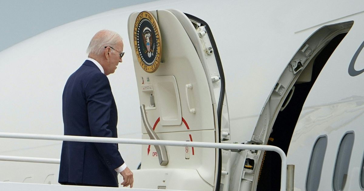 President Joe Biden boards Air Force One Friday at Joint Base Andrews in Maryland.