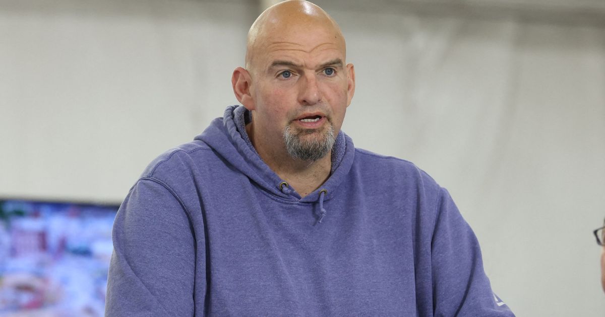 Sen. John Fetterman of Pennsylvania delivers remarks Saturday on the collapse of a section of I-95 in Philadelphia.