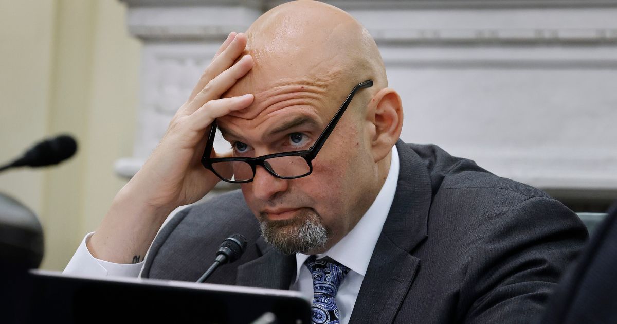 Video: Mystery woman struggles to contain laughter as Fetterman faces difficulties – Is this Democrats’ version of compassion?