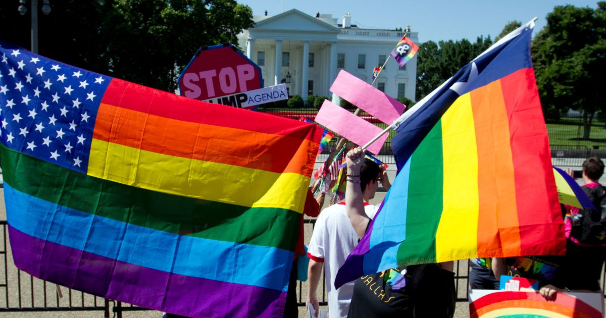 LGBT members and their supporters take part in the Equality March for Unity & Pride parade outside the White House in a file photo from June 2017.