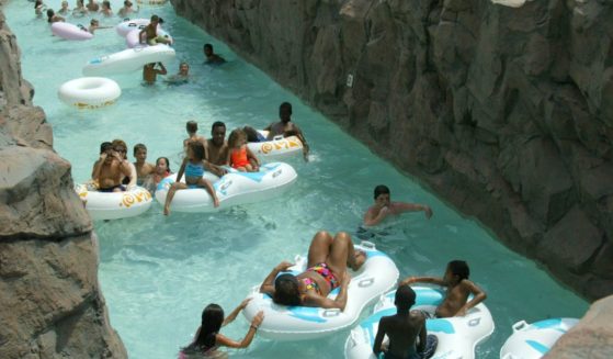 People float down the "Lazy River" at the Chesapeake Beach Water Park in Chesapeake Beach, Maryland, on August 16, 2002.