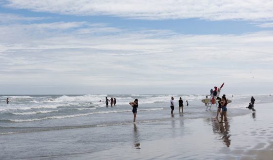 Beachgoers enjoy the sun, sand and water at Wildwood, New Jersey, May 28.