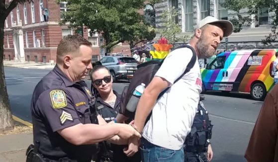 A Christian was arrested for holding up a sign at a "pride" event in Pennsylvania.