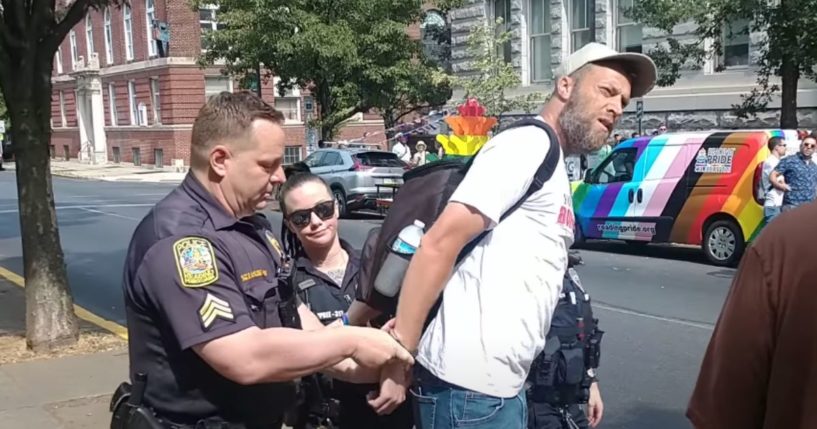 A Christian was arrested for holding up a sign at a "pride" event in Pennsylvania.