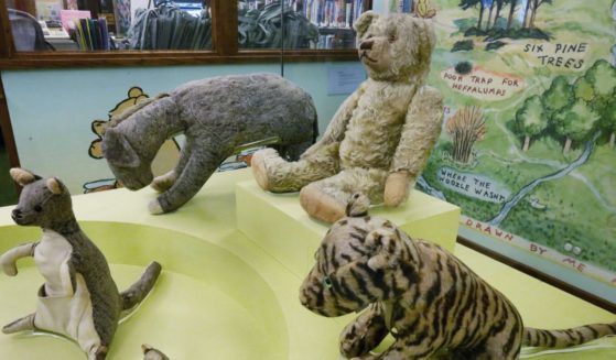 WInnie-the-Pooh story characters are displayed at the main branch of the New York Public Library in New York City on Aug. 3, 2016.