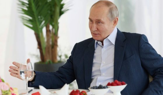 Russian President Vladimir Putin speaks during his meeting with Belarusian President Alexander Lukashenko at the Bocharov Ruchei residence in the resort city of Sochi, Russia, Friday. In the setting of a casual lunch, Putin revealed plans to place nuclear weapons in Belarus.