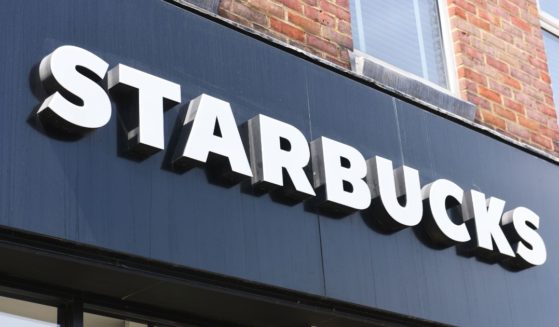 A Starbucks sign is seen in London in May.