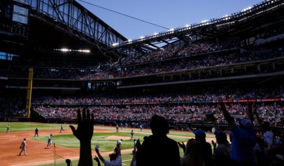 Fans are pictured during a game between the Texas Rangers and the New York Yankees in Arlington, Texas, on April 30.