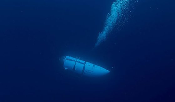 The Titan submersible is seen descending in a photo from the OceanGate website.