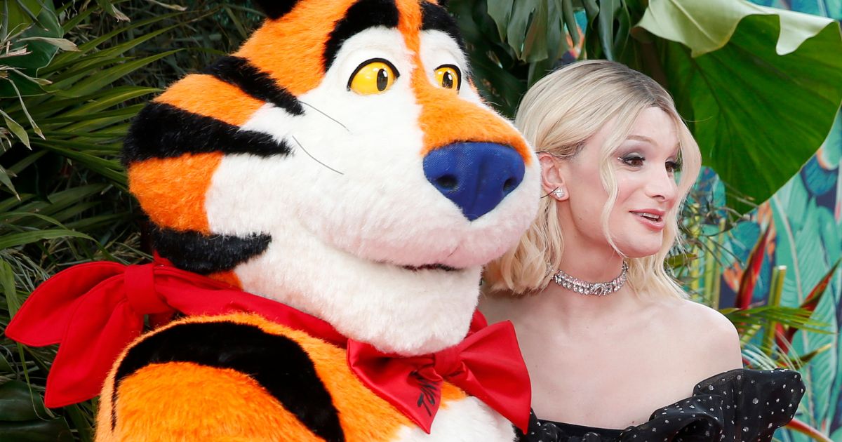 Cereal mascot Tony the Tiger and transgender activist Dylan Mulvaney pose together at the Tony Awards at the United Palace Theater in New York City on Sunday.