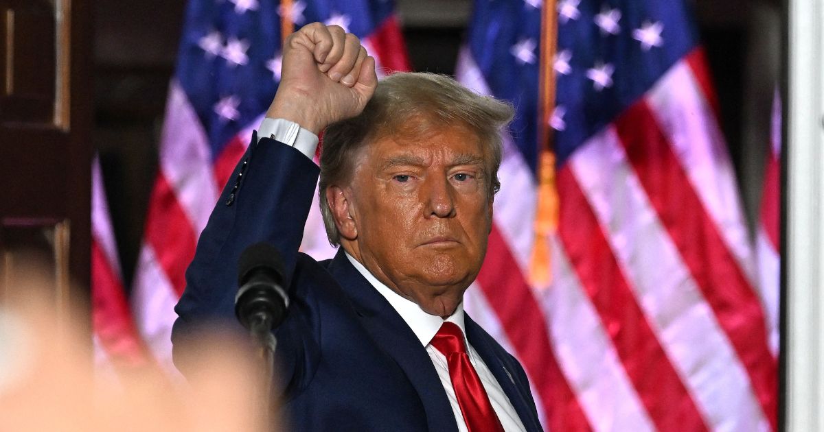 Former President Donald Trump gestures after speaking at Trump National Golf Club Bedminster in Bedminster, New Jersey, on Tuesday following his arraignment in Miami.