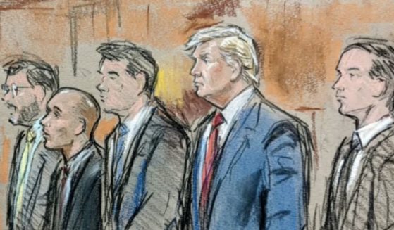 A courtroom sketch by Bill Hennessy shows former President Donald Trump and others in a Miami courtroom.