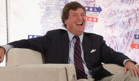 Tucker Carlson, seen in a 2018 appearance, has a broader reach on social media than he ever had during his years at Fox News.