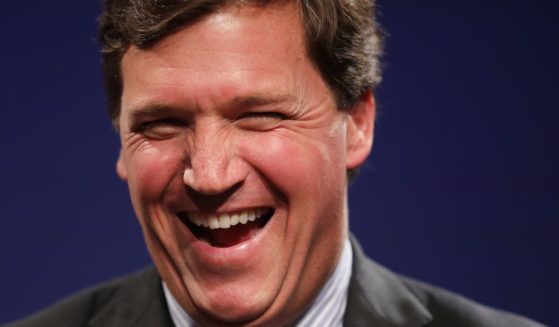 Then-Fox News host Tucker Carlson speaks during the Nation Review Institute's Ideas Summit in Washington, D.C., on March 29, 2019.