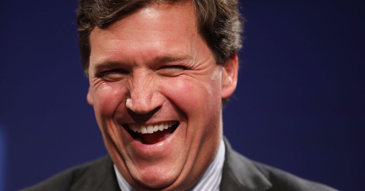 Then-Fox News host Tucker Carlson speaks during the Nation Review Institute's Ideas Summit in Washington, D.C., on March 29, 2019.