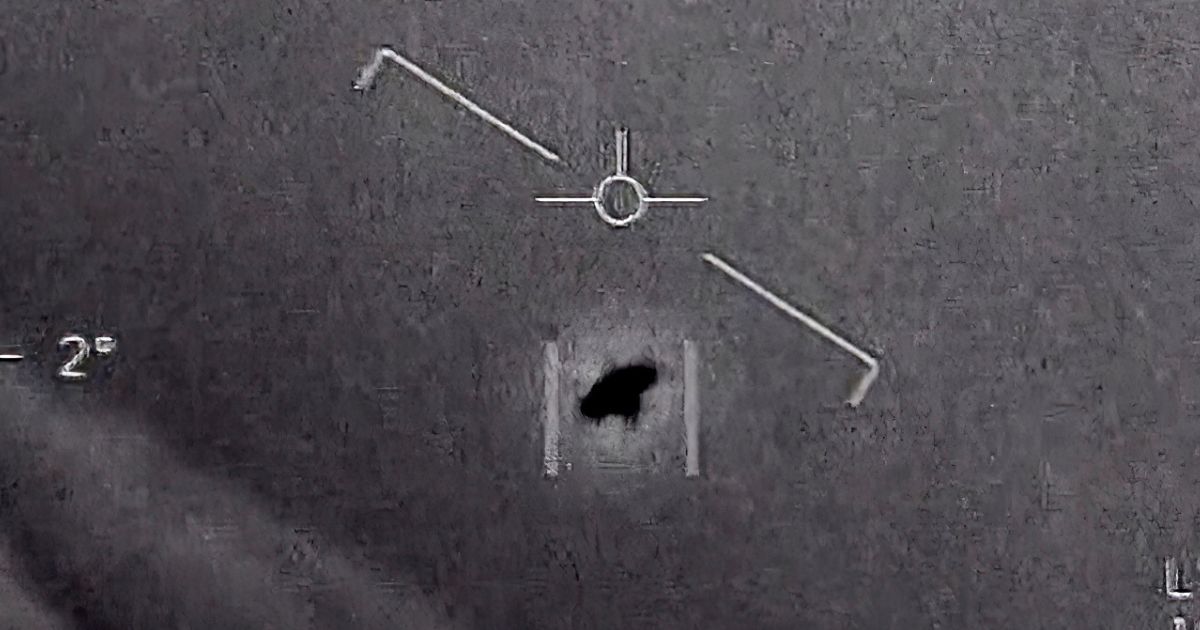 An image released by the Department of Defense shows an unexplained object in the sky captured by naval aviators in 2015.