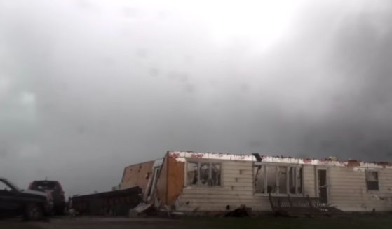 In the spring, an EF4 tornado touched down near the rural farm community of Hedrick, Iowa, demolishing this home but sparing the couple inside.