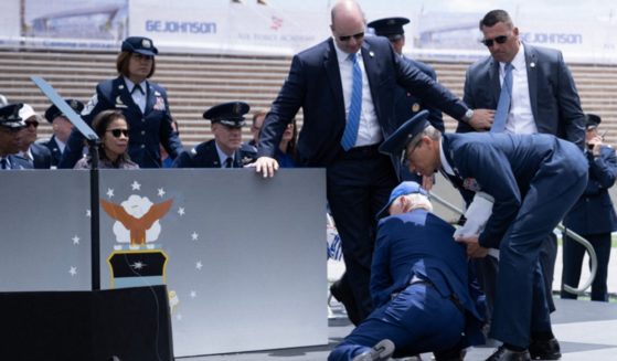 President Joe Biden is helped to his feet after falling last week during the graduation ceremony at the United States Air Force Academy in Colorado.