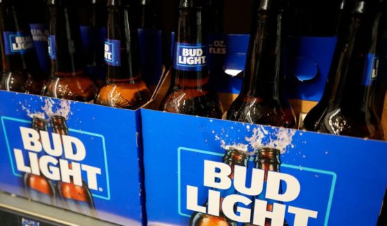 Bottles of Bud Light beer sit on a shelf at a grocery store on April 25 in Glenview, Illinois.