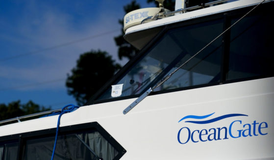 a boat with the OceanGate logo