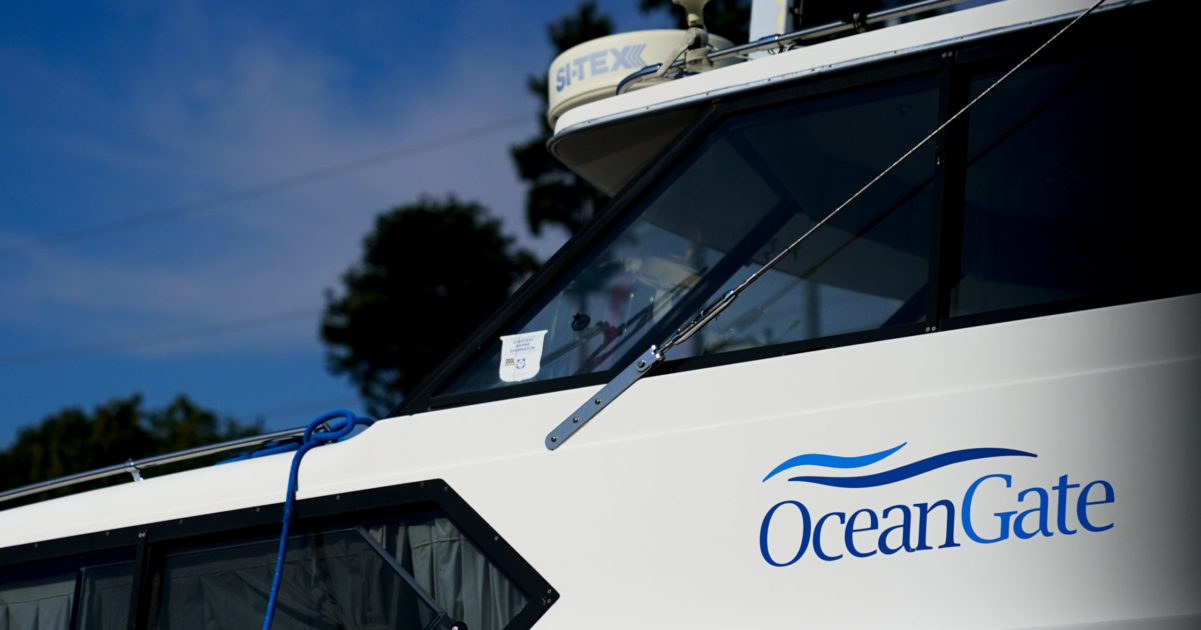 a boat with the OceanGate logo