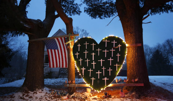 A makeshift memorial with crosses for the victims of the Sandy Hook Elementary School mass shooting stands outside a home on Dec. 14, 2013, on the first anniversary of the tragedy in Newtown, Connecticut. Twenty-six people died in the massacre.