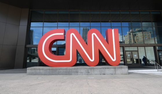 The image is of a CNN sign outside Press Conference for the WBA Super Lightweight Championship at State Farm Arena on May 20, 2021, in Atlanta.