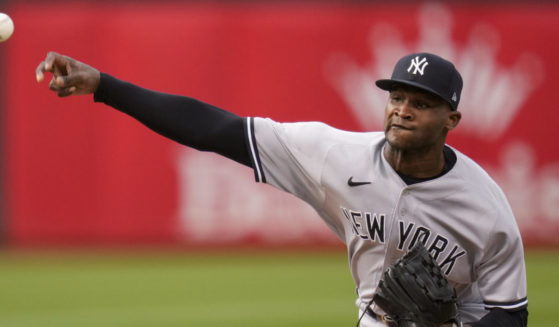 New York Yankees pitcher Domingo Germán throwing