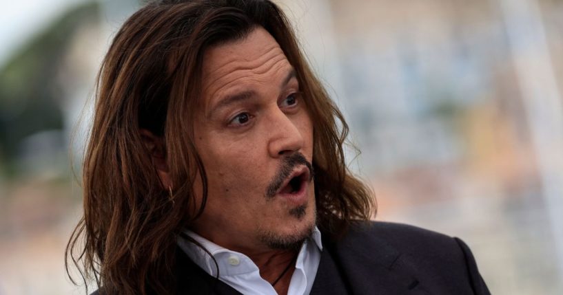 Actor Johnny Depp poses during a photocall for the film "Jeanne Du Barry" during the 76th edition of the Cannes Film Festival in Cannes, southern France, on May 17.