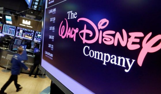 The Walt Disney Co. logo appears on a screen above the floor of the New York Stock Exchange on Aug. 8, 2017, in New York.