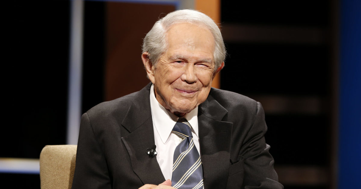 Pat Robertson poses a question to a Republican presidential candidate during a forum