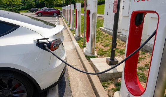 A Tesla electronic vehicle is charged at a Tesla charging station on May 25 in Nashville, Tennessee.