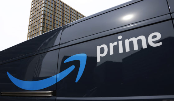 An Amazon Prime delivery vehicle is seen in downtown Pittsburgh in a file photo from March 2020. The Federal Trade Commission sued Amazon on Wednesday for what it called a years-long effort to enroll consumers without consent into its Prime program and making it difficult for them to cancel their subscriptions.