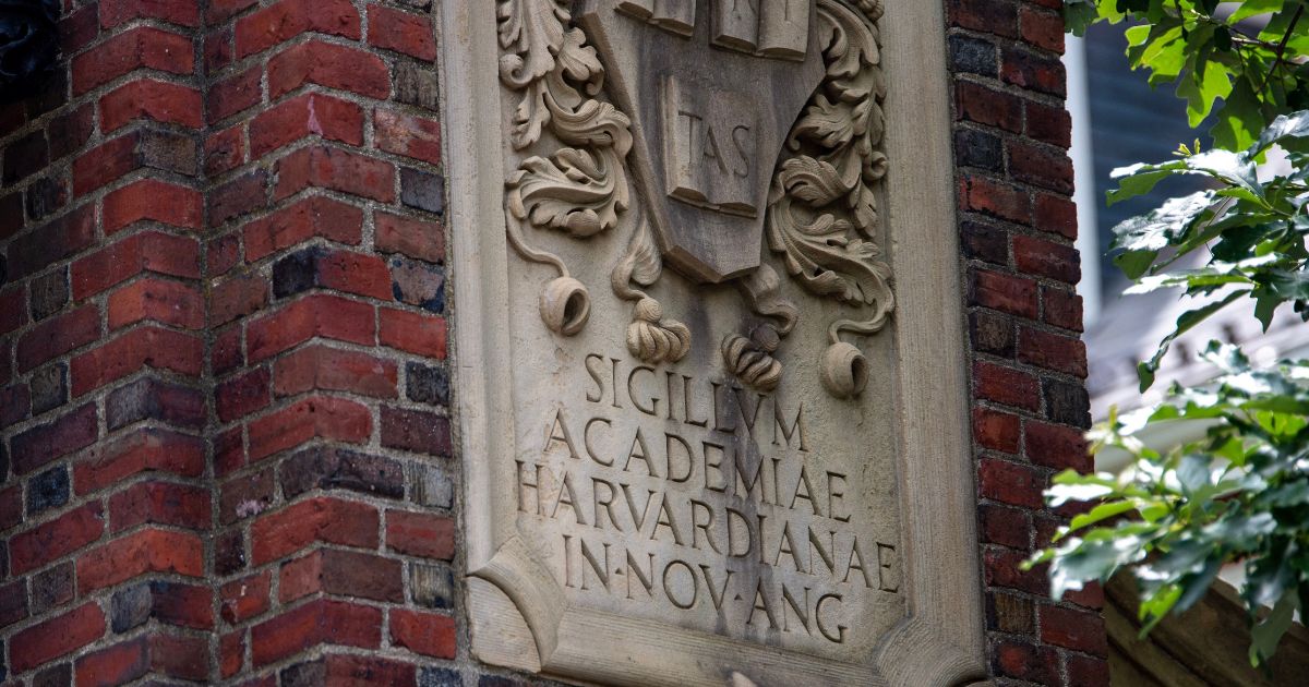 The Harvard University entrance sign to Harvard Yard is seen in Cambridge, Massachusetts, on Thursday.