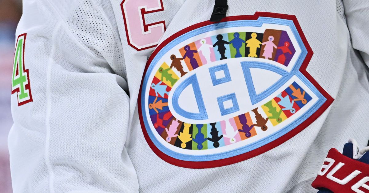 A closeup view of the jersey worn by captain Nick Suzuki #14 of the Montreal Canadiens celebrating "pride" night during warm-ups prior to the game against the Washington Capitals at Centre Bell on April 6 in Montreal, Quebec, Canada.