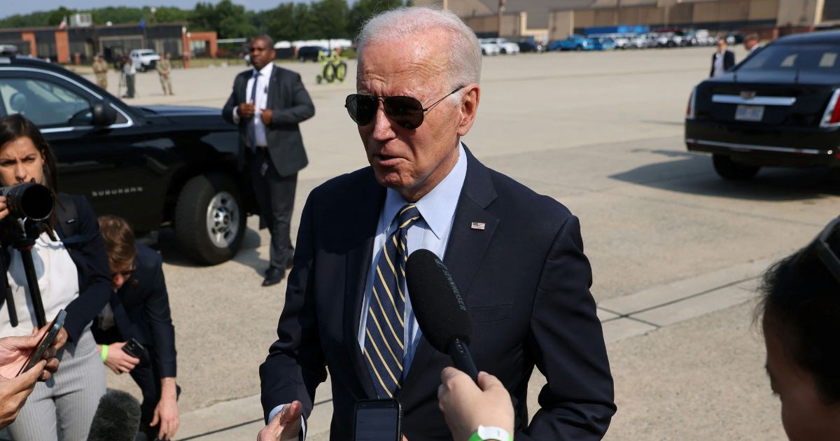 Biden assisted off stage after confusing comment about late Queen of England.