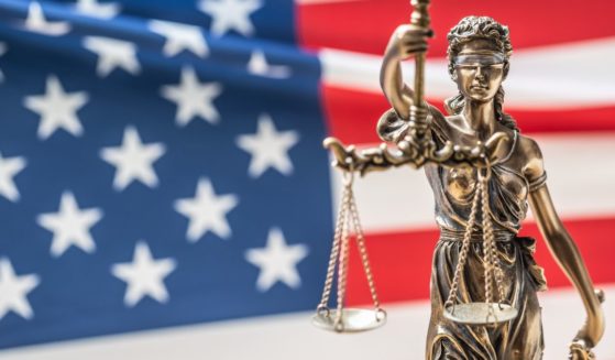A figure of Lady Justice is seen in the above stock image.