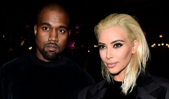 Kim Kardashian and Kanye West attend the Balmain show as part of the Paris Fashion Week Womenswear Fall/Winter 2015/2016 on March 5, 2015, in Paris.