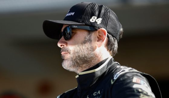 Jimmie Johnson, driver of the #84 Club Wyndham Chevrolet, waits in the garage area during qualifying for the NASCAR Cup Series EchoPark Automotive Grand Prix at Circuit of The Americas on March 25 in Austin, Texas.