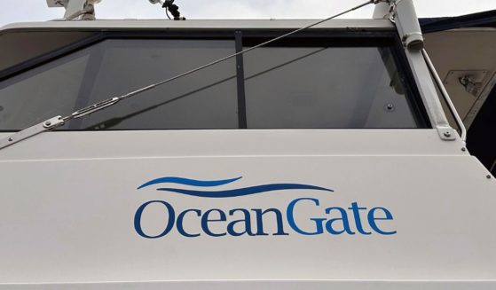 The logo for OceanGate Expeditions is seen on a boat parked near the offices of the company at a marine industrial warehouse office door in Everett, Washington, on June 20.