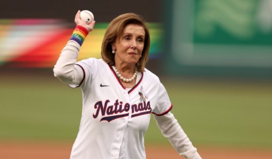 Rep. Nancy Pelosi throws out the ceremonial first pitch before the start of the Washington Nationals and Arizona Diamondbacks game at Nationals Park on Tuesday in Washington.