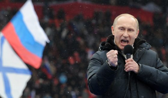 Vladimir Putin delivers a speech during a rally of his supporters at the Luzhniki stadium in Moscow on February 23, 2012.