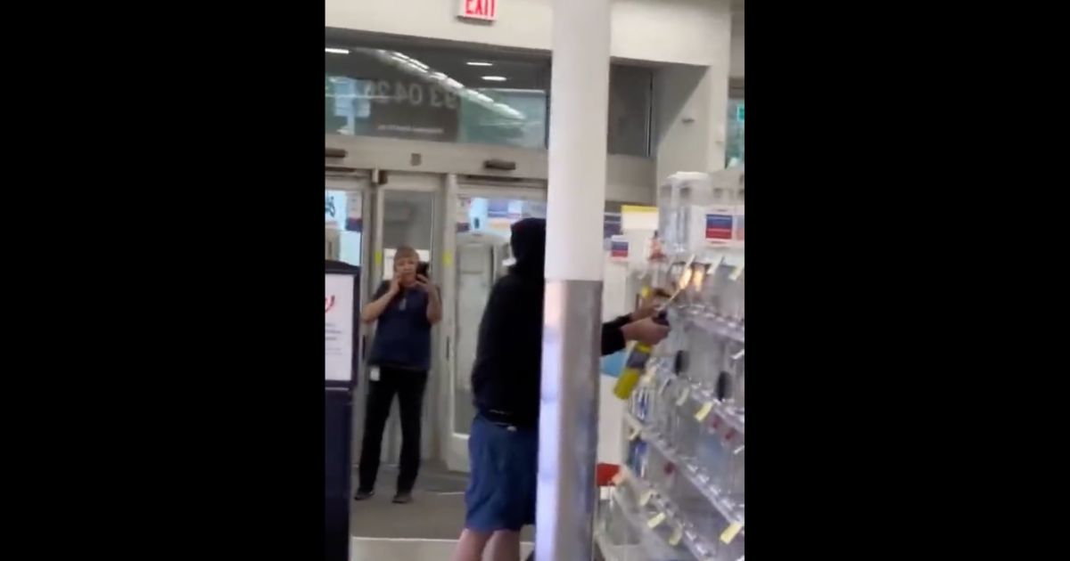 A shoplifter is seen breaching a Walgreens' security measure with a blowtorch in a tweet from June 22.