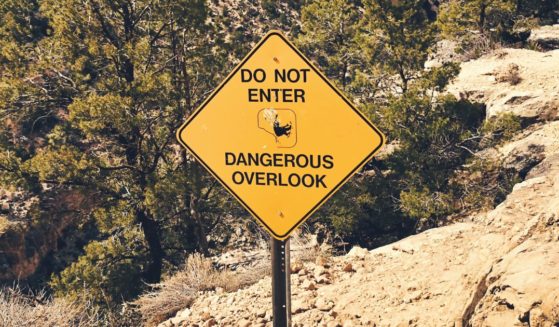 A warning sign is seen at Arizona's Grand Canyon in an undated stock photo.