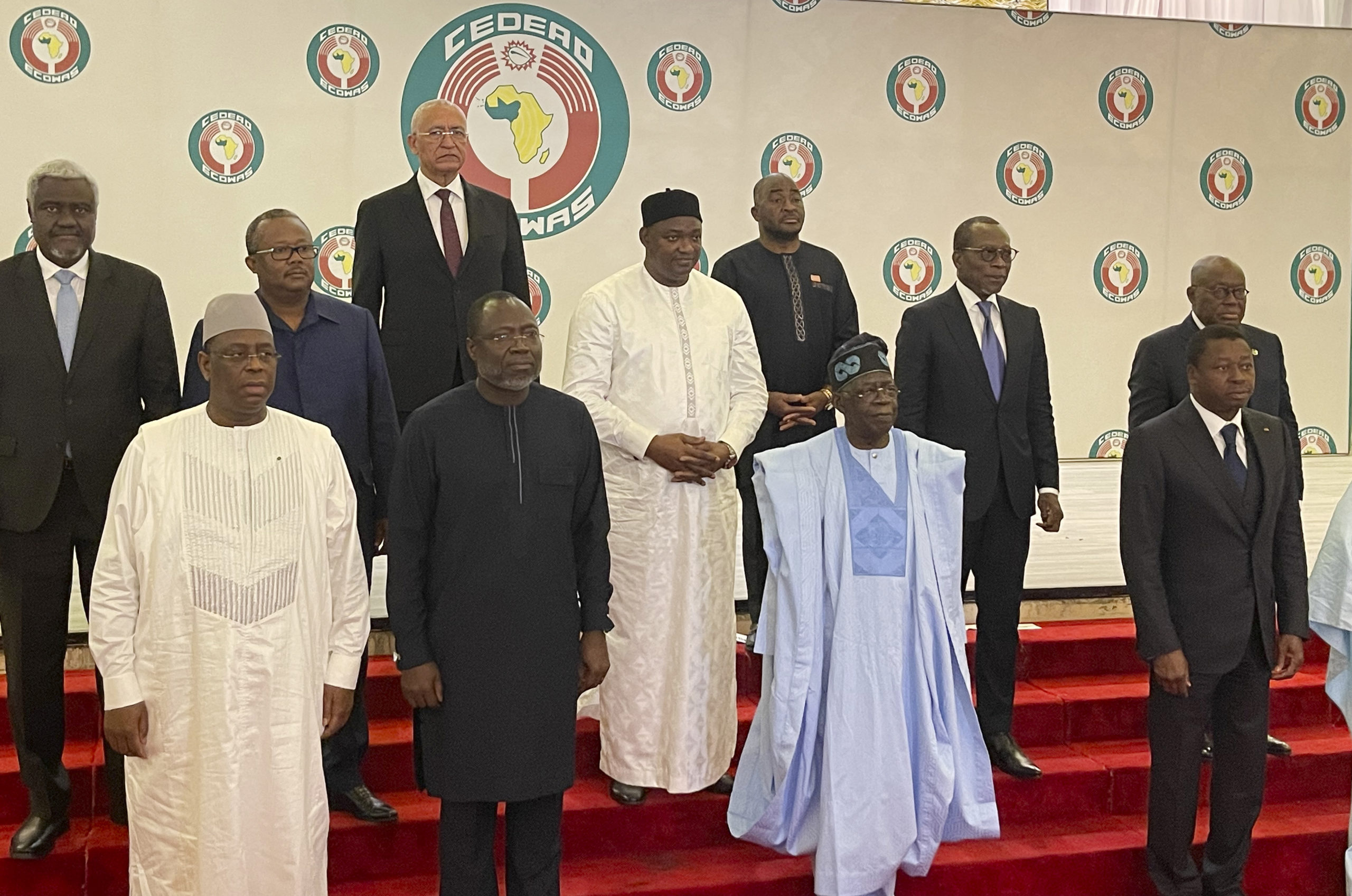 Nigeria President, Bola Ahmed Tinubu, second from left, poses , for a group photograph with other West Africa leaders after a meeting in Abuja Nigeria, Sunday, July 30, 2023. At an emergency meeting Sunday in Abuja, Nigeria, the West African bloc known as ECOWAS said that it was suspending relations with Niger, and authorized the use of force if President Mohamed Bazoum is not reinstated within a week. The African Union has issued a 15-day ultimatum to the junta in Niger to reinstall the democratically elected government.