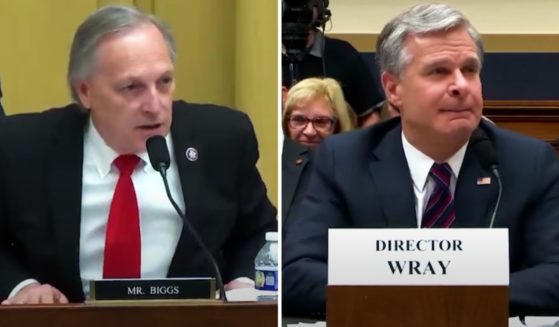 Arizona Rep. Andy Biggs, left, questions FBI Director Christopher Wray during a House Judiciary Committee hearing on Wednesday.