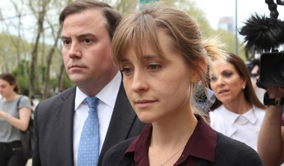 Allison Mack departs the United States Eastern District Court in New York City following a bail hearing in relation to the sex trafficking charges filed against her on May 4, 2018.