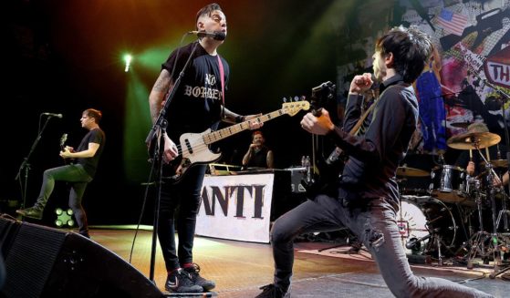 From left, Chris Head, Chris Barker and Justin Sane of Anti-Flag perform at ACL Live in Austin, Texas, on Feb. 2.