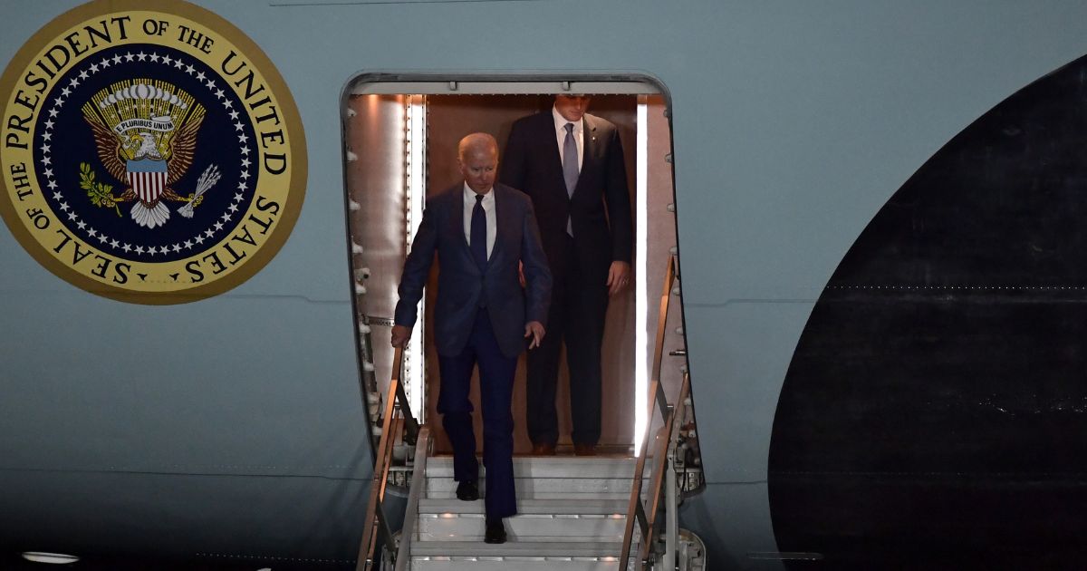 President Joe Biden disembarks from Air Force One in Antrim, Northern Ireland, in a file photo from April. After numerous tripping incidents, Biden has taken to using the shorter drop-down staircase on the aircraft.